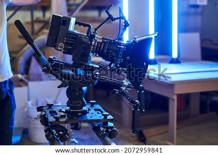 professional video camera for shooting video on a rail system. slider camcorder