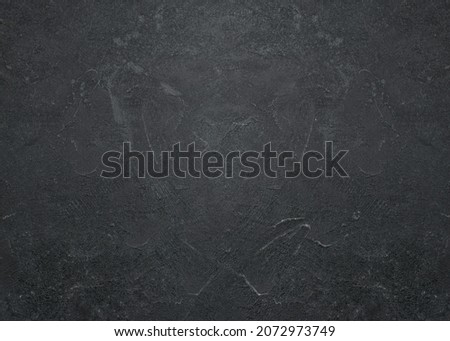 Natural stone texture. Black marble, matt surface, Italian slab, granite, ivory texture, ceramic wall and floor tiles. Rustic Natural porcelain stoneware background high resolution. Limestone pattern.