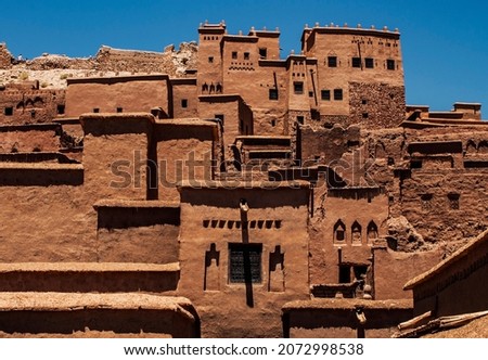 Ksar of Ait-Ben-Haddou, caravan route between the Sahara and Marrakech in Atlas Mountains, Ouarzazate Province, Morocco, Africa. Organic mud-built Berber village of merchants' houses known as kasbahs. Royalty-Free Stock Photo #2072998538