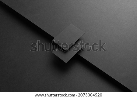 Black branding stationery mockup template, real photo, letterhead, flyer, poster, business card, envelope. Blank isolated on black background to place your design.