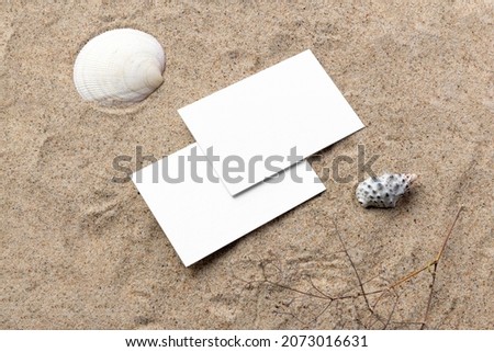 Business cards branding mockup template, real photo, blank isolated on the real sand background to place your design.