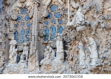 Detail of the facade of sacred family "La Sagrada Familia" , cathedral designed by Gaudi, being built since 19 March 1882 with people donations Royalty-Free Stock Photo #2073061358
