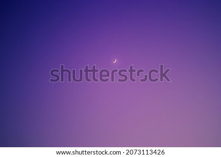 The moon on a purple sky