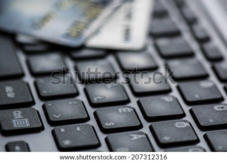 Concept of online shopping with keyboard and credit card