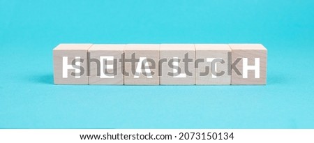 The word health is standing on wooden cubes, healthy lifestyle, blue background