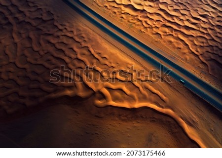 A road between the sands, aerial photography, Saudi Arabia

