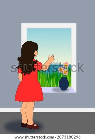 A girl in a red dress is standing by a window and pointing at a sailboat on the ocean.