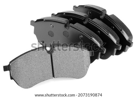 Brake pad set prepared for wear indicator, auto parts isolated Royalty-Free Stock Photo #2073190874