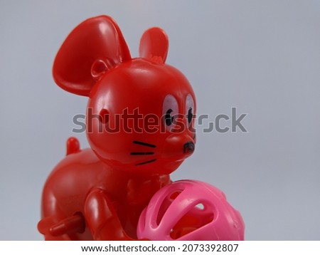 baby toy, toy mouse carrying ball