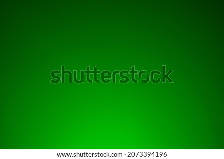 Image with gradient green background.