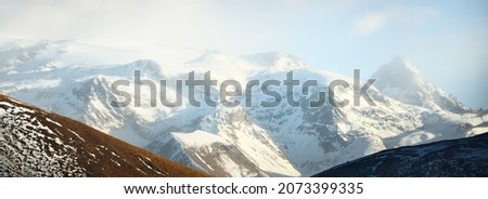 Snow-covered mountain peaks of French Alps. France, Europe. Winter, Christmas vacations, tourism, winter sport, ski, hiking