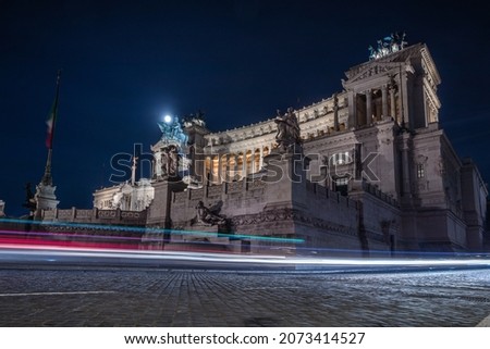 Cool long exposure cars traffic light trails, night view of the city of Rome. Piazza Venezia.
 Royalty-Free Stock Photo #2073414527