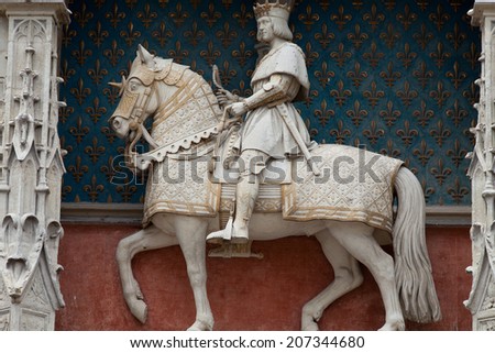 Statue of King Louis XII on the entrance to Chateau de Blois. Loire Valley, France
