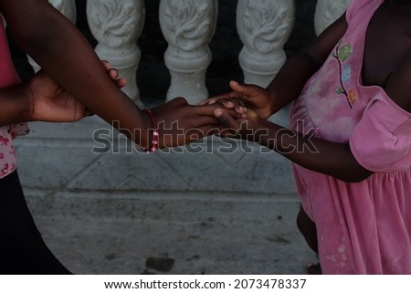 Children holding hands in Dominican Republic 