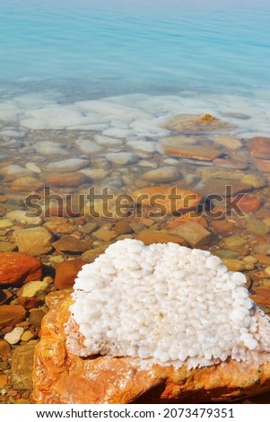 A picture of the Dead Sea beach in Jordan, which is characterized by its salty and mineral waters