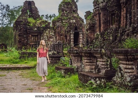 Woman tourist in Temple ruin of the My Son complex, Vietnam. Vietnam opens to tourists again after quarantine Coronovirus COVID 19 Royalty-Free Stock Photo #2073479984