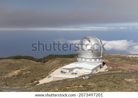 The ash plume (smoke, fume) from volcanic eruption above Gran Telescopio Canarias, Roque de los Muchachos Observatory (ORM) on La Palma, Canary Islands, Spain.