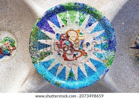 Detail of mosaic in the ceiling of The Hypostyle Room in The famous Parc Güell designed by the architect Gaudí in the city of Barcelona. Royalty-Free Stock Photo #2073498659