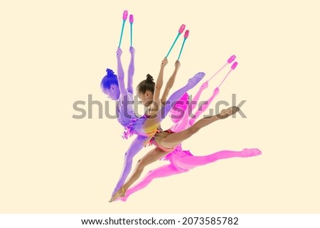 Creative collage of girl, professional rhytmic gymnast training with clubs isolated over white background. Glitch and duotine effect. Concept of art, sport, motivation, action. Copy space for ad