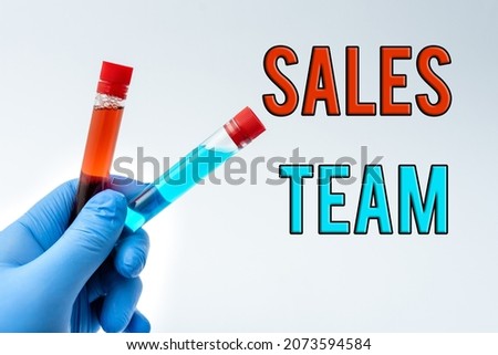 Text sign showing Sales Team. Business showcase they are responsible for of selling products or services Presenting Medical Samples Laboratory Testing New Virus Medicine