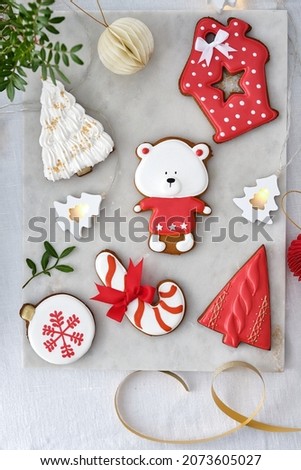 Set of different Christmas cookies on white background.