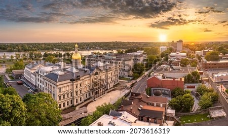 Aerial panorama of Trenton New Jersey skyline amd state capitol at sunset. Trenton is the capital city of the U.S. state of New Jersey and the county seat of Mercer County. Royalty-Free Stock Photo #2073616319