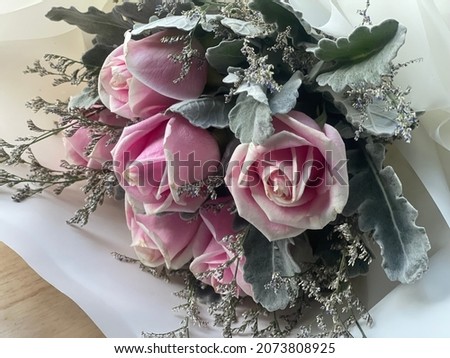 Floral bouquet of pink roses flower with green leaves, valentines day concept or love day.