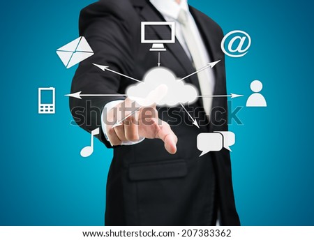 Businessman hand touch cloud computing concept on blue background