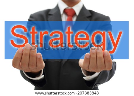 businessman holding strategy board banner