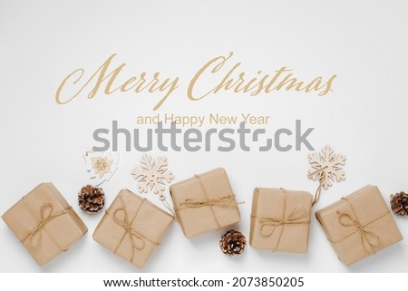 Festive background mockup for Christmas or New Year . Gifts in paper eco-friendly packaging white background
