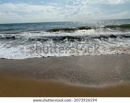 Tropical sea landscape. Beach with white sand and blue sky with clouds, nobody. Relax and paradise.
