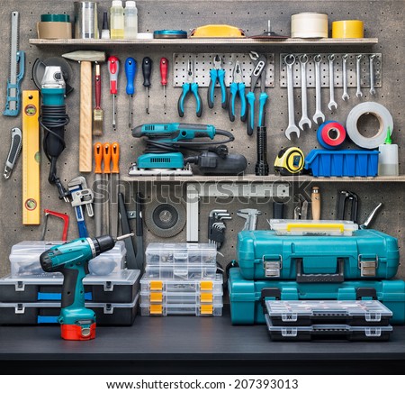 Workshop scene.  Tools on the table and board. Royalty-Free Stock Photo #207393013