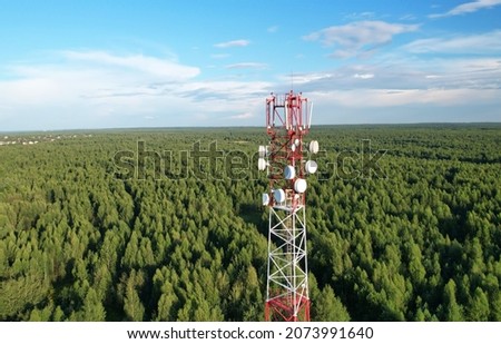 Mobile Tower installation. Cell site and Telecom Base Station. 5G internet online generation. Health Hazards Caused By Mobile Tower Radiation. Telecommunications and Wireless network. Wifi antenna. Royalty-Free Stock Photo #2073991640