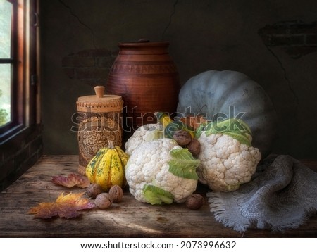 Still life with vegetables and walnuts