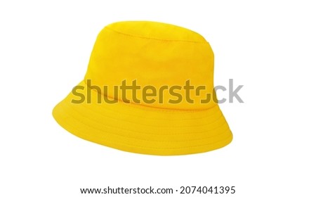 yellow bucket hat isolated on white Royalty-Free Stock Photo #2074041395