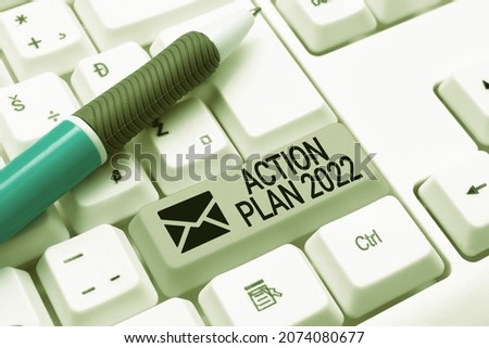 Text caption presenting Action Plan 2022. Conceptual photo proposed strategy or course of actions for current year Abstract Typist Practicing Speed Typing, Programmer Debugging Codes