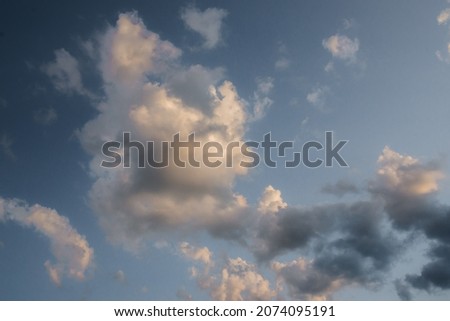 cumulus storm clouds on the background of a blue sky after a thunderstorm