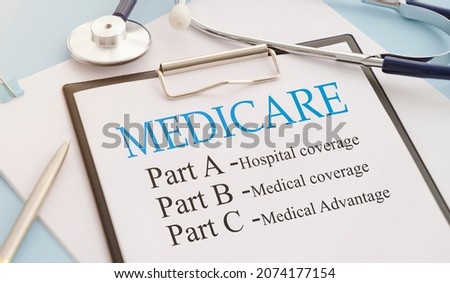 Stethoscope with medicare form with parts list. Royalty-Free Stock Photo #2074177154