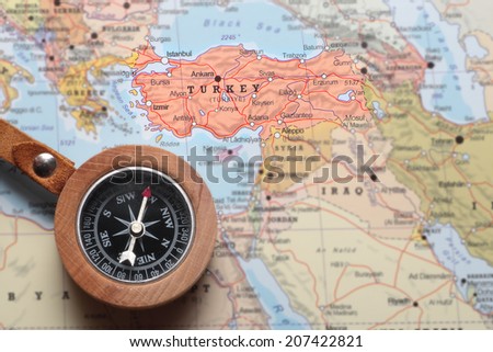 Compass on a map pointing at Turkey and planning a travel destination Royalty-Free Stock Photo #207422821
