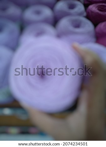 Abstract embroidery thread with blur photo suitable for design background