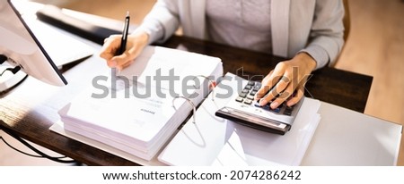 IRS Tax Audit. African American Female Auditor Doing Debt Fraud Inspection Royalty-Free Stock Photo #2074286242