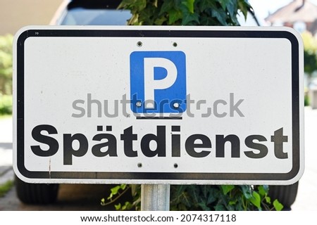 Parking lot sign in front of a clinic that reads: Late shift 