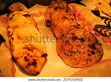 A picture of butter nan roti with selective focus