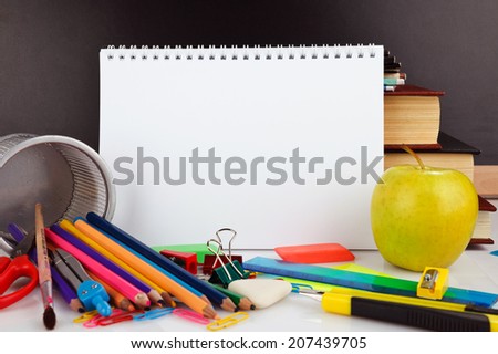 Notebook with school stationary objects supplies, copyspace