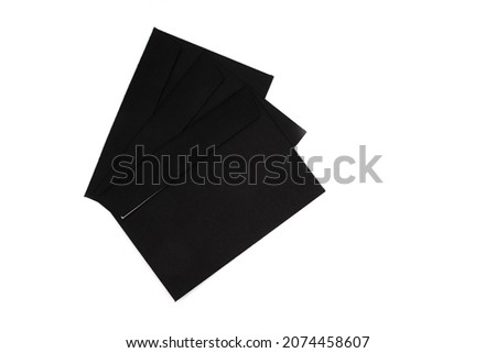 Isolated photos of black postal envelopes