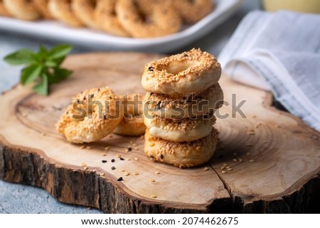 Turkish Bagel with sesame seeds or salty ring cookies. Turkish name; Kandil simidi or tuzlu halka kurabiye Royalty-Free Stock Photo #2074462675