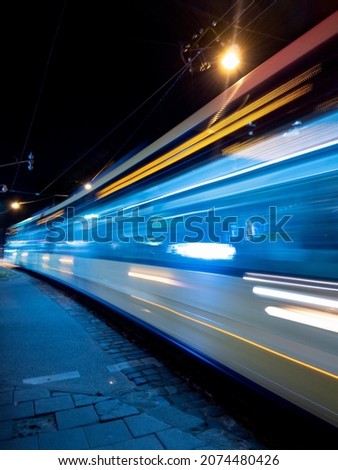 photo of a tram, long exposure 