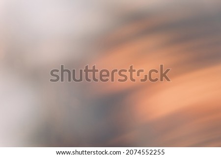 Defocused glow overlay. Light flare. Bokeh optical radiance. Sunlight reflection. Blur orange white black color rays spot abstract background.