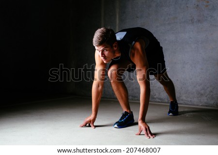 Photo of a runner ready to start