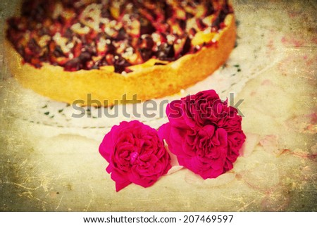 vintage style picture of a plum cake with decoration